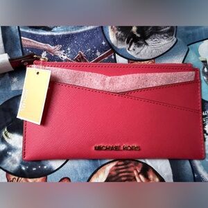 Michael Kors wristlet wallet in red.